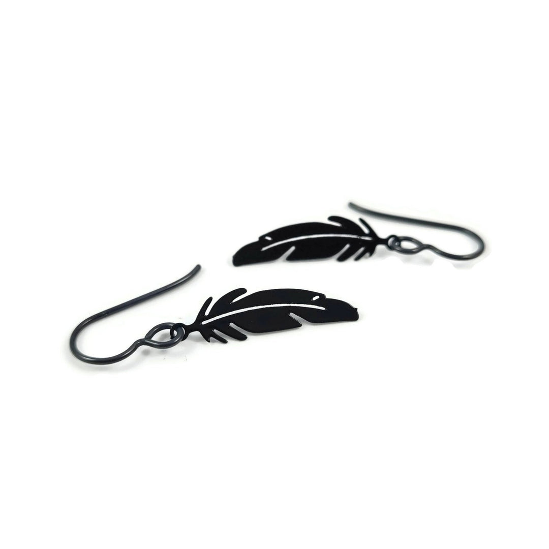 Black tiny feather niobium earrings