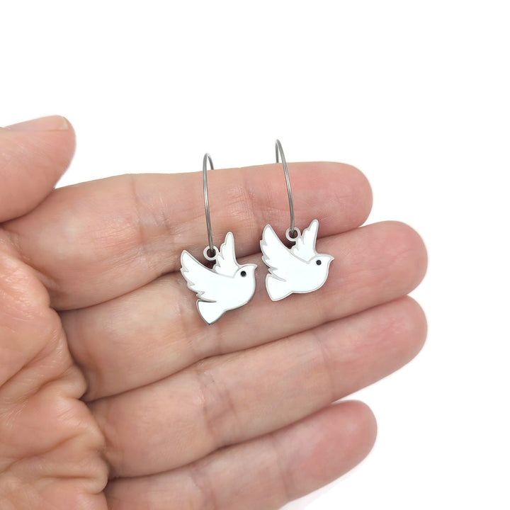 White dove titanium hoop earrings