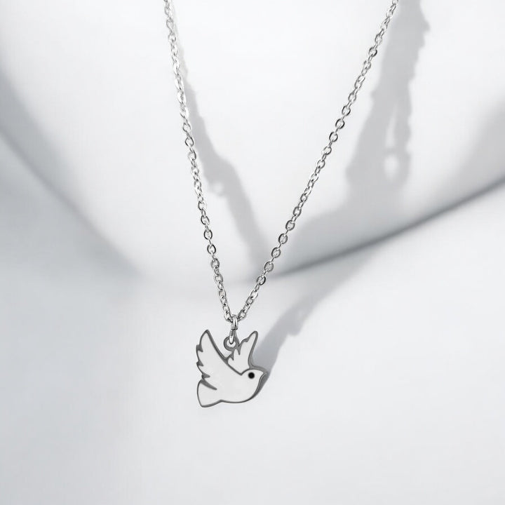 Dainty white dove surgical steel necklace