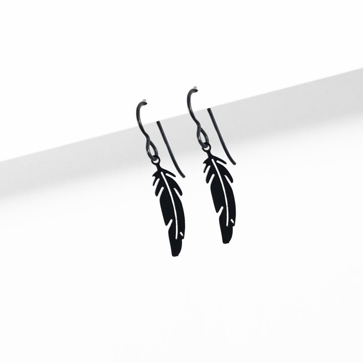 Black tiny feather niobium earrings