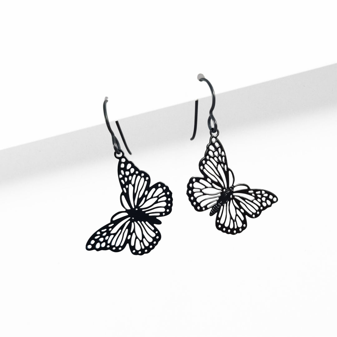 Black butterfly niobium earrings