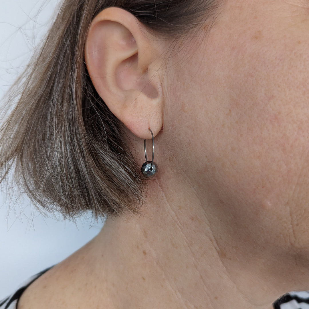 Geometric beads titanium hoop earrings