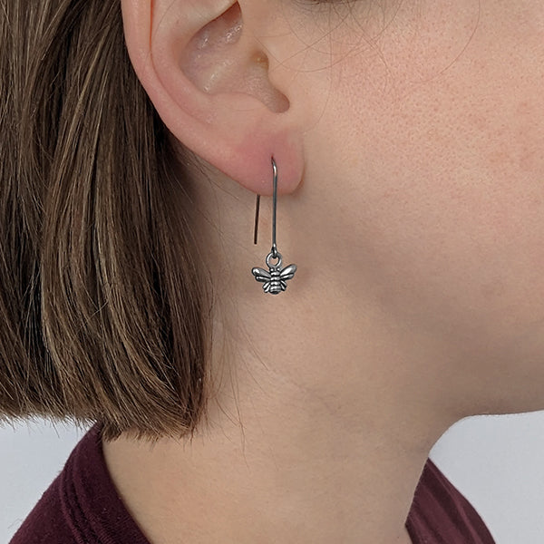 Minimalist bee drop niobium earrings