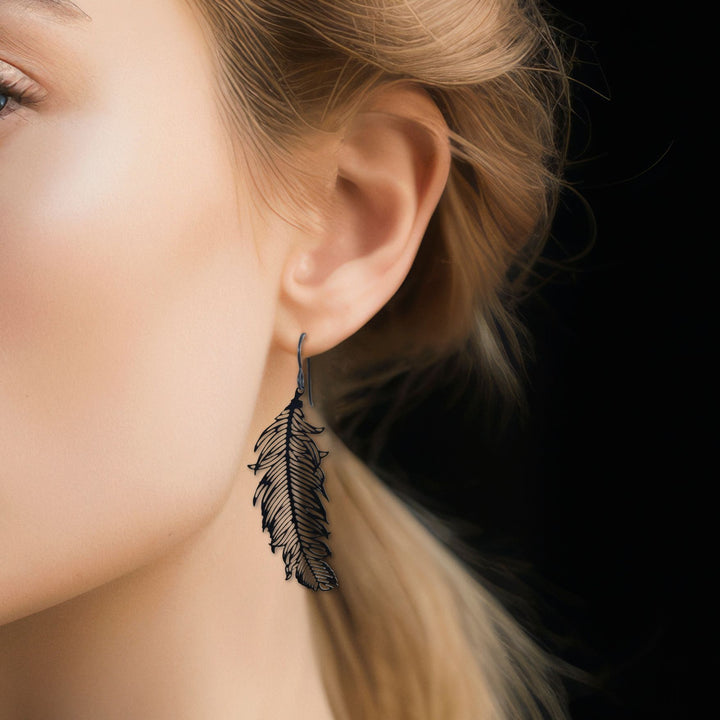 Black feather niobium earrings