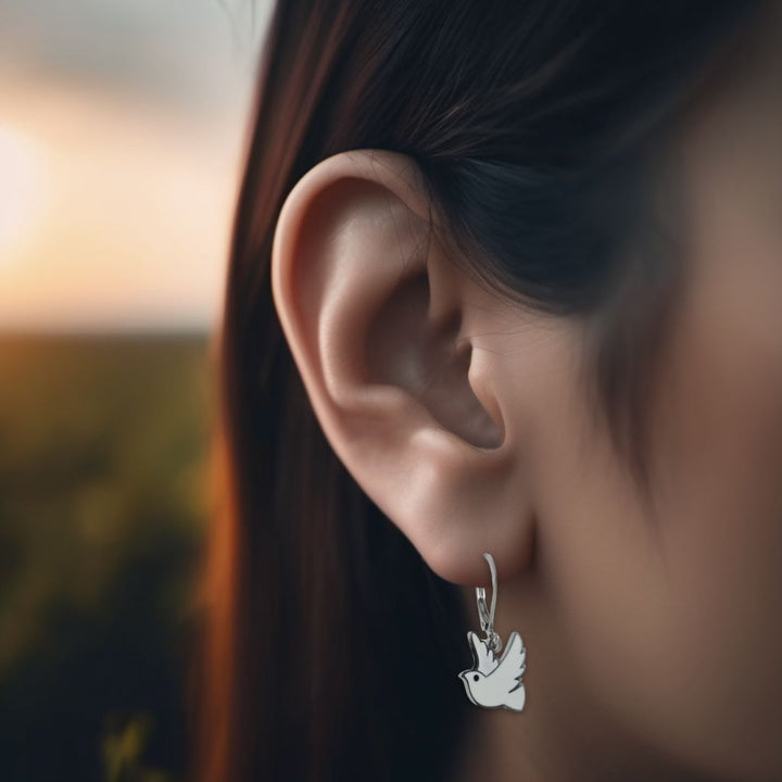 White dove surgical steel leverback earrings