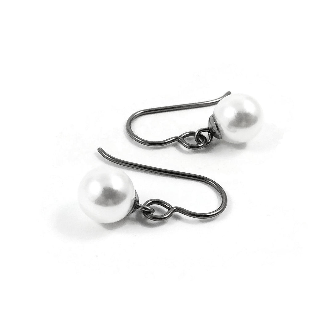 Boucle d'oreille perles blanches