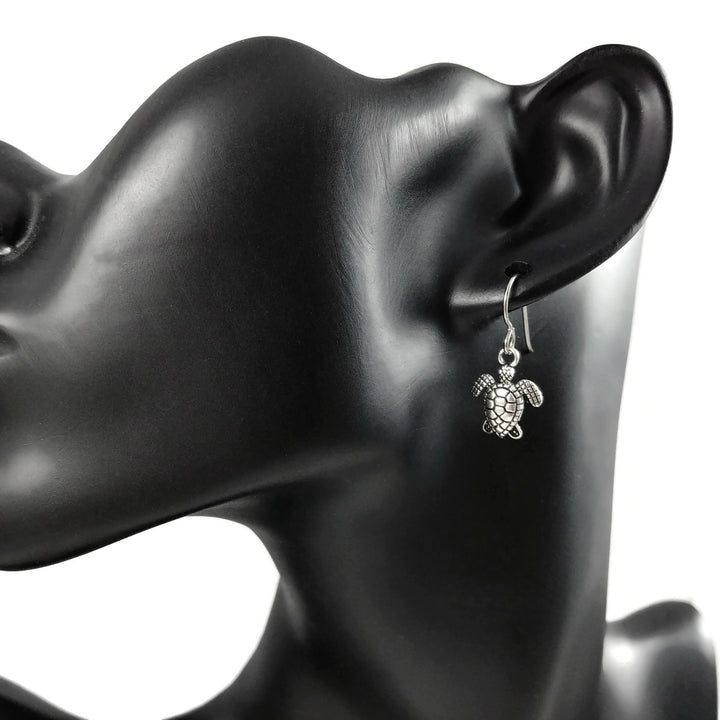 Dainty silver turtle dangle earrings
