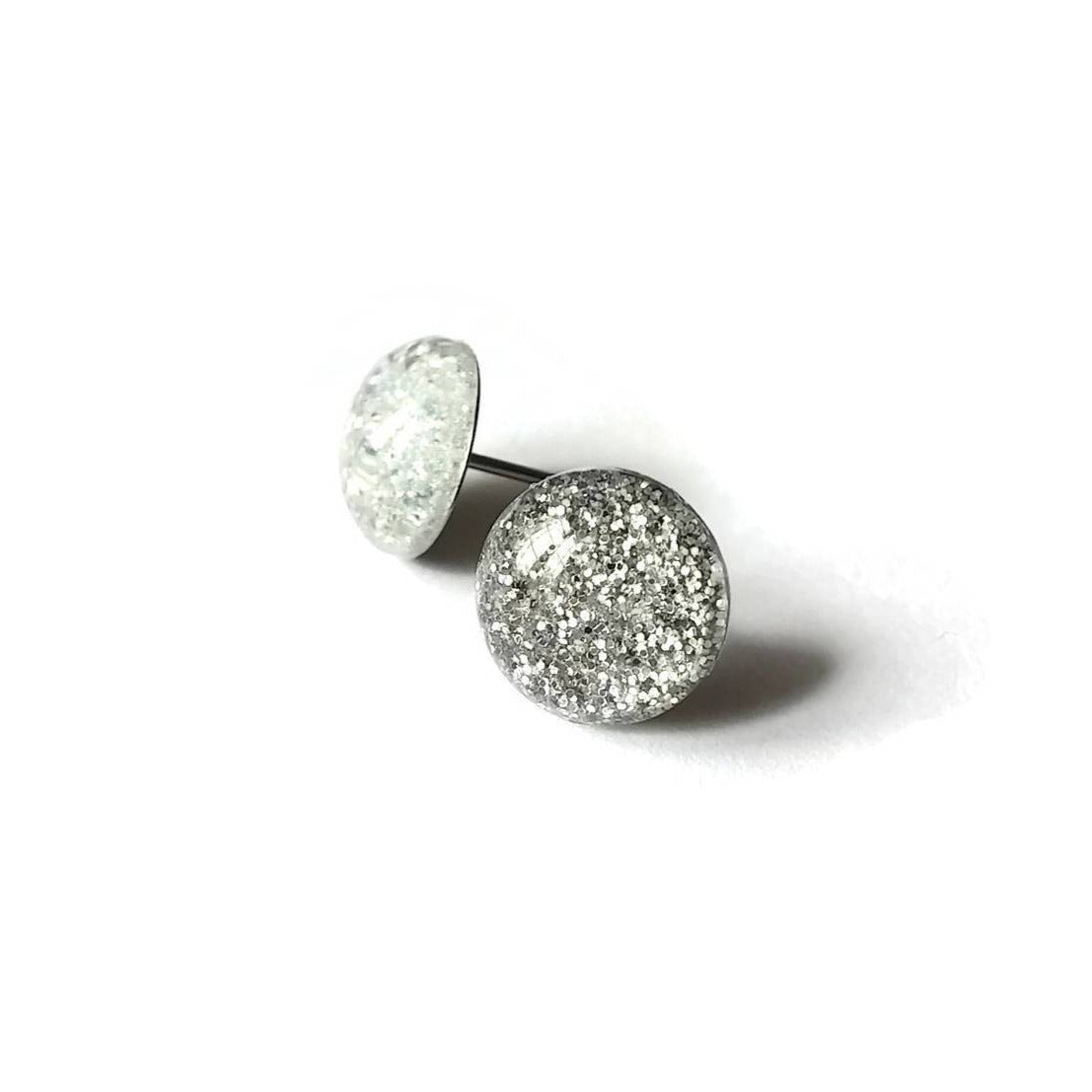 White and silver glitter titanium stud earrings
