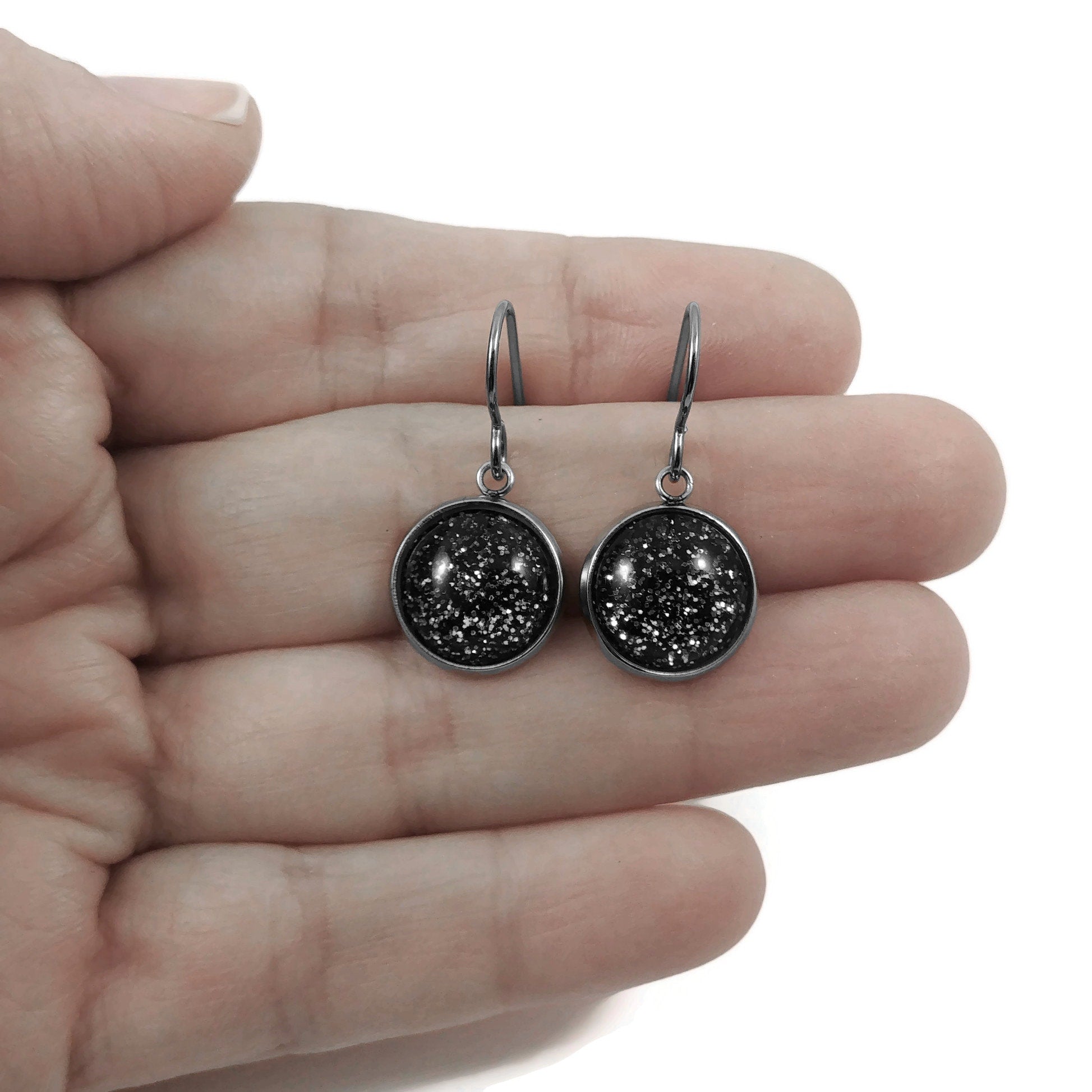 Black titanium stud earrings, Hypoallergenic implant grade jewelry, Glitter resin cabochon earrings