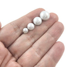 Pearly stud earrings, Implant grade titanium earrings, White plastic jewelry